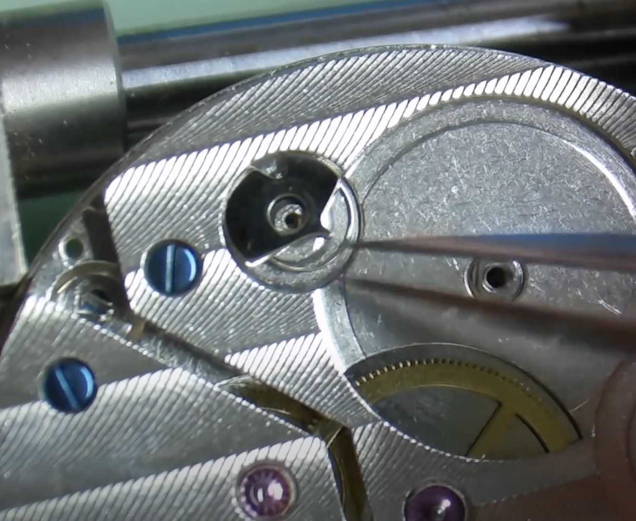 Roue de rochet, cliquet et ressort